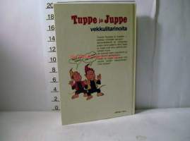 Tuppe ja Juppe auttavat norsua